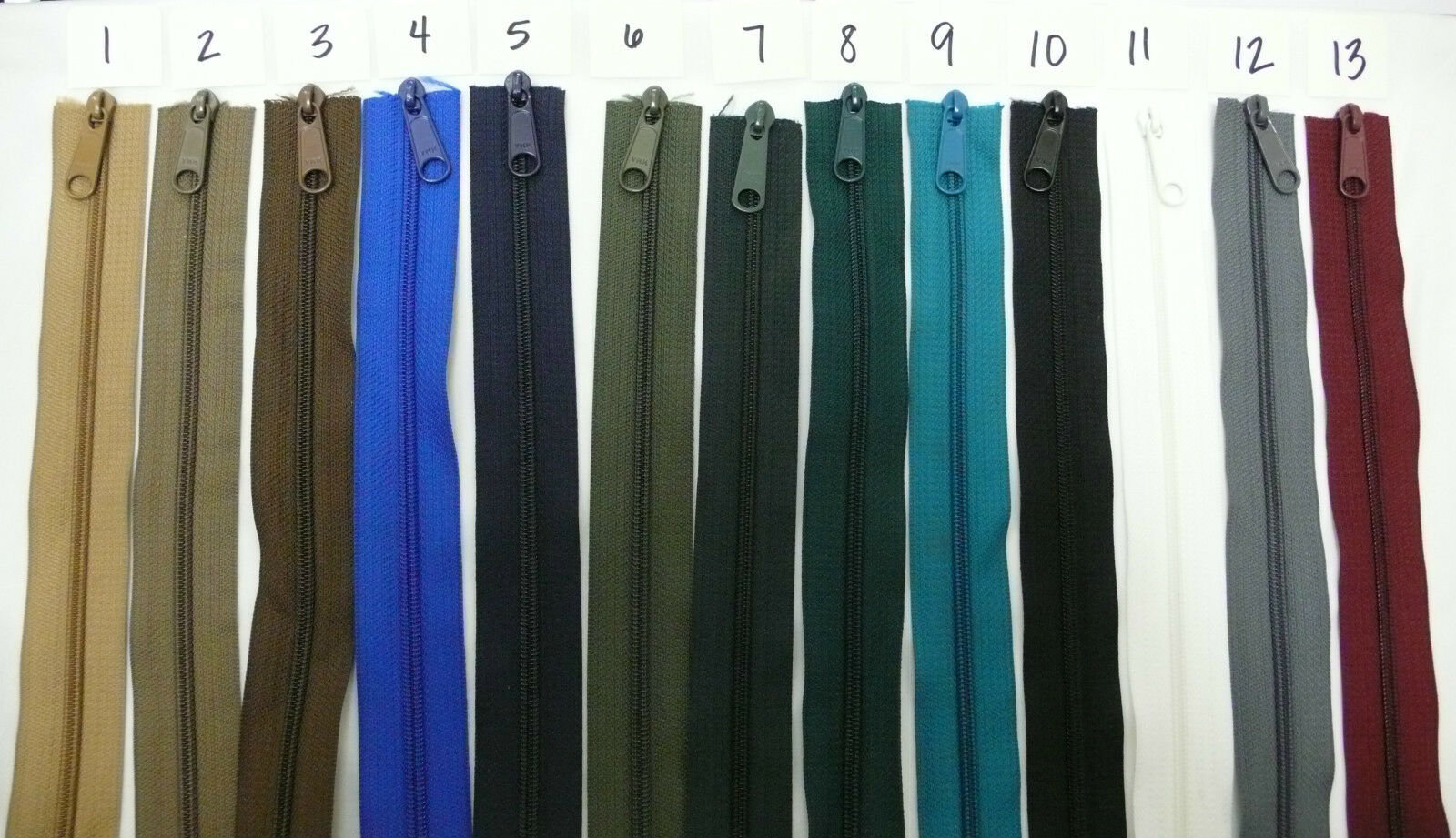 NYLON ZIPPER BUY BY THE YARD WITH MATCHING YKK PULLS .45 VARIOUS COLORS